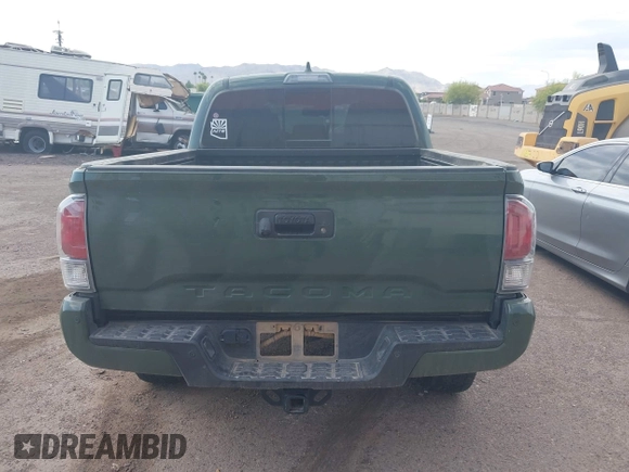 2021 Toyota Tacoma SR z VIN 3TYCZ5AN2MT049069, wystawiony jako IAAI lot #42116964 z przebiegiem 96 275 mil mil oraz . Historia ofert i sprzedaży dostępna na DreamBid. Obrazek 16.