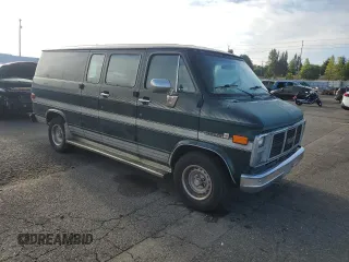 1991 GMC Vandura z VIN 1GDEG25K6M7504729, wystawiony jako Copart lot #71146614 z przebiegiem 181 800 mil mil oraz Tytuł czysty. Historia ofert i sprzedaży dostępna na DreamBid. Obrazek 4.