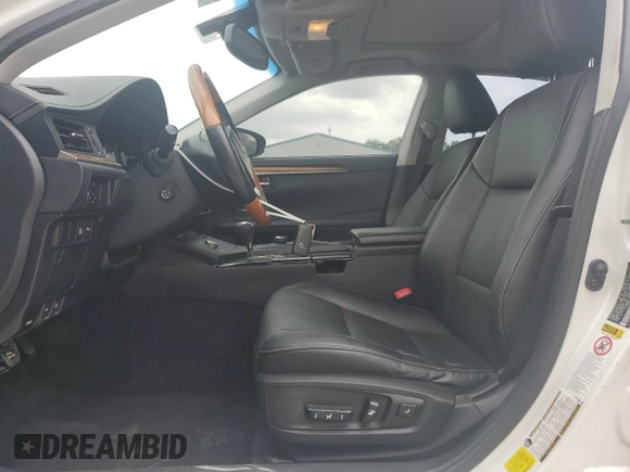 2014 Lexus ES 300h with VIN JTHBW1GG7E2049643, listed as a Copart auction lot 60874975 with 137,188 mi miles and Salvage title. Bid and sale history available at DreamBid. Image 7.