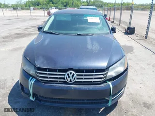 2014 Volkswagen Passat Wolfsburg Ed with VIN 1VWAS7A34EC032338, listed as a IAAI auction lot 42013753 with 116,168 mi miles. Bid and sale history available at carsss.com. Image 6.