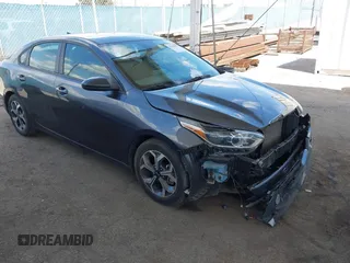 2019 Kia Forte LXS with VIN 3KPF24AD9KE067221, listed as a IAAI auction lot 41945475 with 54,457 mi miles and . Bid and sale history available at carsss.com. Image 1.