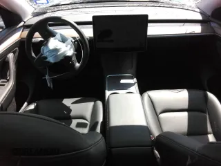 2024 Tesla Model Y Long Range with VIN 7SAYGAEE6RF196245, listed as a Copart auction lot 54667765 with 10,336 mi miles and Salvage title. Bid and sale history available at DreamBid. Image 8.