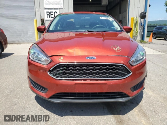 2018 Ford Focus SE z VIN 1FADP3F2XJL254750, wystawiony jako Copart lot #61907545 z przebiegiem 71 328 mil mil oraz Szkoda całkowita • Salvage title. Historia ofert i sprzedaży dostępna na DreamBid. Obrazek 5.