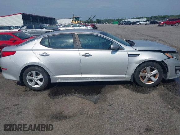 2015 Kia Optima LX with VIN 5XXGM4A75FG378795, listed as a IAAI auction lot 42604014 with 57,199 mi miles and . Bid and sale history available at DreamBid. Image 13.