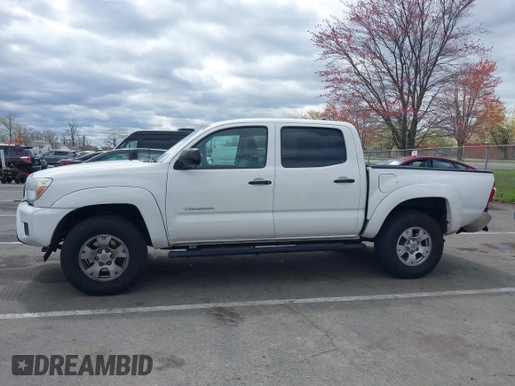2015 Toyota Tacoma with VIN 5TFLU4EN6FX120947, listed as a IAAI auction lot 42043239 with 125,480 mi miles and . Bid and sale history available at DreamBid. Image 14.