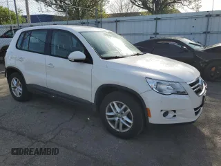 2011 Volkswagen Tiguan SE with VIN WVGBV7AX6BW525168, listed as a Copart auction lot 53824915 with 113,628 mi miles and Salvage Title. Bid and sale history available at DreamBid. Image 4.