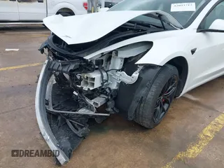2023 Tesla Model 3 Performance z VIN 5YJ3E1EC8PF487550, wystawiony jako IAAI lot #42093712 z przebiegiem 27 305 mil mil oraz . Historia ofert i sprzedaży dostępna na DreamBid. Obrazek 21.