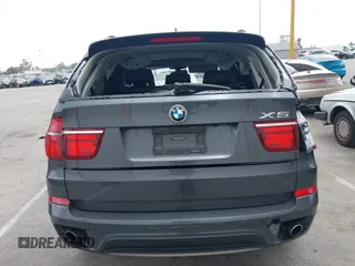 2013 BMW X5 xDrive35i z VIN 5UXZV4C57D0E04976, wystawiony jako IAAI lot #42111435 z przebiegiem 160 226 mil mil oraz . Historia ofert i sprzedaży dostępna na DreamBid. Obrazek 15.