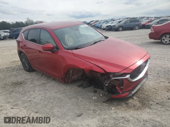 2021 Mazda CX-5 Touring with VIN JM3KFACM7M0334633, listed as a Copart auction lot 51618875 with 70,558 mi miles and Salvage Title. Bid and sale history available at DreamBid. Image 4.