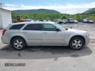 2005 Dodge Magnum SXT z VIN 2D4GZ48V358579406, wystawiony jako IAAI lot #42198627 z przebiegiem 264 473 mil mil oraz . Historia ofert i sprzedaży dostępna na DreamBid. Obrazek 13.