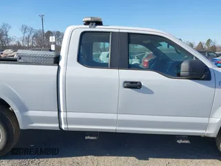 2017 Ford F-150 XL z VIN 1FTEX1E86HFA80659, wystawiony jako IAAI lot #41657909 z przebiegiem 158 726 mil mil oraz . Historia ofert i sprzedaży dostępna na DreamBid. Obrazek 14.