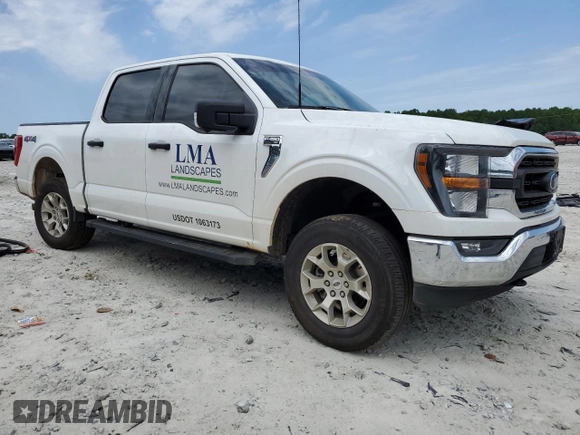 2023 Ford F-150 XL with VIN 1FTFW1E85PKG17275, listed as a Copart auction lot 57497155 with 34,379 mi miles and Salvage title. Bid and sale history available at DreamBid. Image 4.