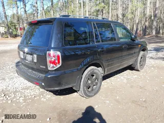 2006 Honda Pilot EX-L with RES with VIN 5FNYF18616B001541, listed as a IAAI auction lot 41894731 with 207,364 mi miles. Bid and sale history available at carsss.com. Image 4.