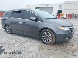 2014 Honda Odyssey Touring with VIN 5FNRL5H98EB008953, listed as a IAAI auction lot 42291179 with Not provided miles and . Bid and sale history available at DreamBid. Image 1.