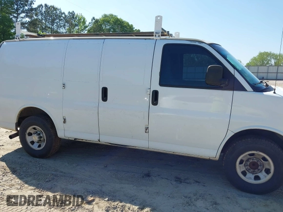 2009 Chevrolet Express Cargo Van with VIN 1GCGG25C791125061, listed as a IAAI auction lot 42131397 with 247,397 mi miles. Bid and sale history available at carsss.com. Image 6.