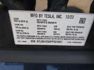 2023 Tesla Model S with VIN 5YJSA1E54PF531021, listed as a IAAI auction lot 42014104 with Not provided miles and . Bid and sale history available at DreamBid. Image 9.