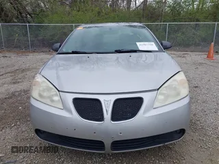 2006 Pontiac G6 6-Cyl z VIN 1G2ZG558064154096, wystawiony jako IAAI lot #41987316 z przebiegiem 221 130 mil mil oraz . Historia ofert i sprzedaży dostępna na DreamBid. Obrazek 13.