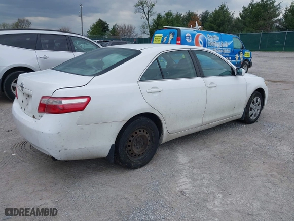 2007 Toyota Camry CE with VIN 4T1BE46KX7U664699, listed as a IAAI auction lot 42040572 with 201,624 mi miles. Bid and sale history available at carsss.com. Image 4.