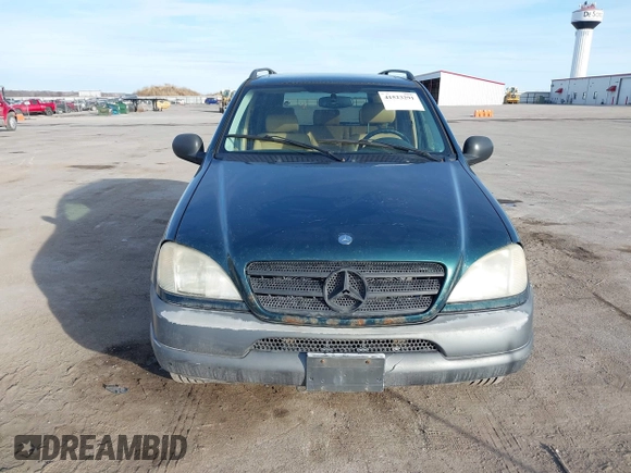 1998 Mercedes-Benz M-Class with VIN 4JGAB54E7WA034632, listed as a IAAI auction lot 41523291 with 153,241 mi miles. Bid and sale history available at carsss.com. Image 6.