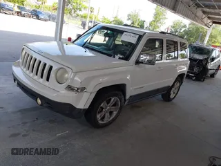 2014 Jeep Patriot High Altitude with VIN 1C4NJPFA1ED653402, listed as a IAAI auction lot 42371410 with 165,459 mi miles and . Bid and sale history available at DreamBid. Image 17.