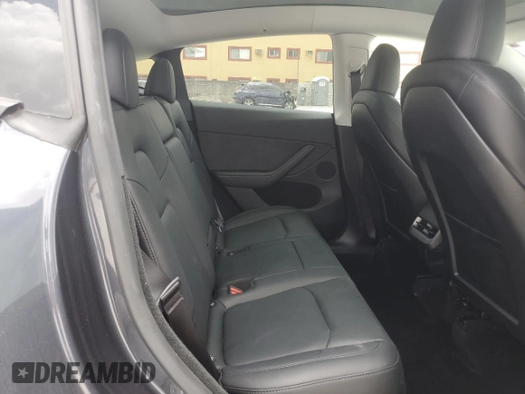 2024 Tesla Model Y Long Range с VIN 7SAYGDEE7RA279293, выставлен на аукционе Copart как лот 62758065 с пробегом 23 271 миль миль и Списание • Salvage title. История ставок и продаж доступна на DreamBid. Изображение 10.