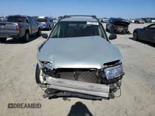 2006 Subaru Forester 2.5 X with VIN JF1SG63686H746381, listed as a Copart auction lot 77260714 with 208,580 mi miles and Salvage Title. Bid and sale history available at carsss.com. Image 5.