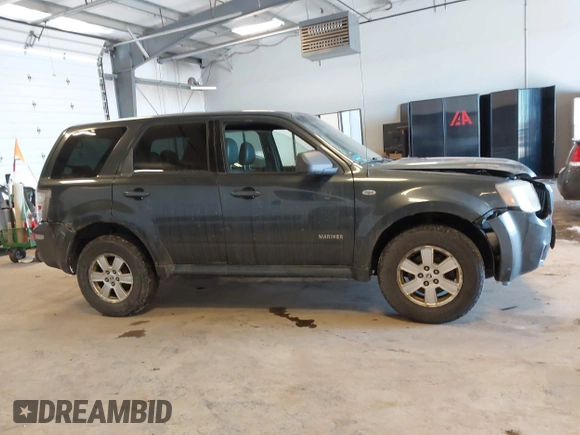 2008 Mercury Mariner with VIN 4M2CU81158KJ14013, listed as a IAAI auction lot 41305863 with 229,672 mi miles and . Bid and sale history available at DreamBid. Image 13.