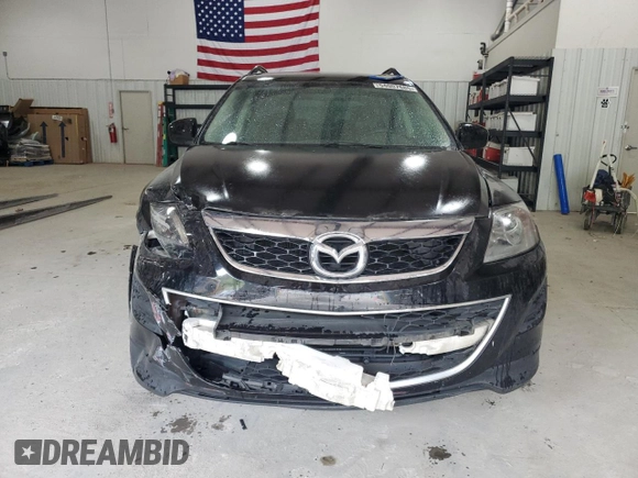 2012 Mazda CX-9 Touring z VIN JM3TB2CA7C0359154, wystawiony jako Copart lot #54007685 z przebiegiem 192 671 mil mil oraz Szkoda całkowita • Salvage title. Historia ofert i sprzedaży dostępna na DreamBid. Obrazek 5.