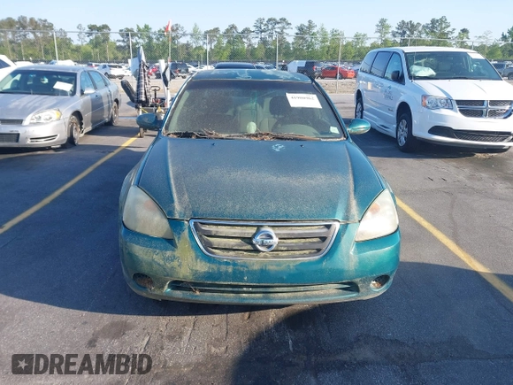 2003 Nissan Altima S with VIN 1N4AL11DX3C128760, listed as a IAAI auction lot 41980962 with 249,200 mi miles. Bid and sale history available at carsss.com. Image 6.