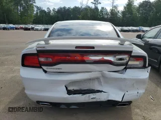 2012 Dodge Charger SE with VIN 2C3CDXBG1CH146027, listed as a Copart auction lot 55129565 with 219,879 mi miles and Salvage Title. Bid and sale history available at DreamBid. Image 6.