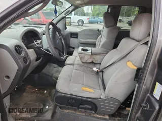 2005 Ford F-150 STX with VIN 1FTRX12W55FB32573, listed as a Copart auction lot 59602715 with 238,701 mi miles and Salvage title. Bid and sale history available at DreamBid. Image 7.