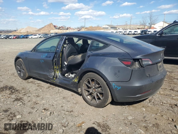 2022 Tesla Model 3 Long Range with VIN 5YJ3E1EB7NF257549, listed as a Copart auction lot 46980555 with 68,955 mi miles and Salvage Title. Bid and sale history available at DreamBid. Image 2.
