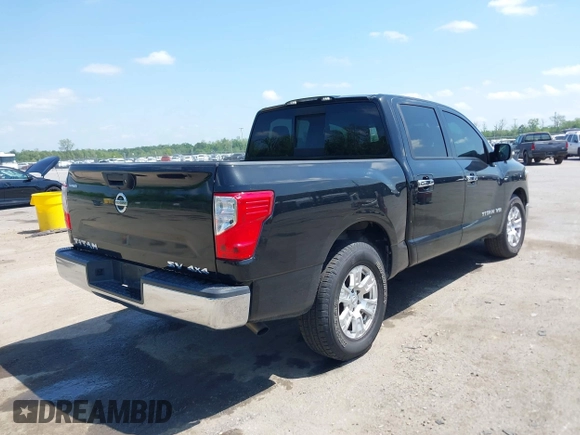 2018 Nissan Titan SV with VIN 1N6AA1EJ4JN529655, listed as a IAAI auction lot 42051405 with 153,599 mi miles and . Bid and sale history available at DreamBid. Image 4.