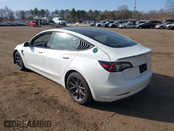 2021 Tesla Model 3 Long Range with VIN 5YJ3E1EB2MF858267, listed as a IAAI auction lot 41782360 with 79,671 mi miles and . Bid and sale history available at DreamBid. Image 3.