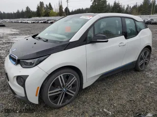 2015 BMW i3 with VIN WBY1Z4C56FV278923, listed as a Copart auction lot 52256475 with 106,855 mi miles and Clean Title. Bid and sale history available at carsss.com. Image 1.