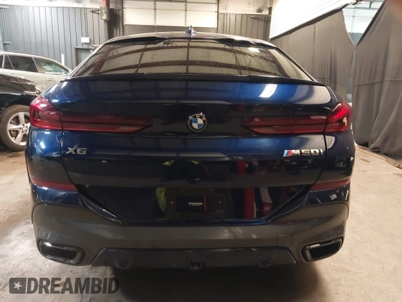 2022 BMW X6 M50i z VIN 5UXCY8C05N9J70601, wystawiony jako IAAI lot #42344397 z przebiegiem 49 085 mil mil oraz . Historia ofert i sprzedaży dostępna na DreamBid. Obrazek 16.