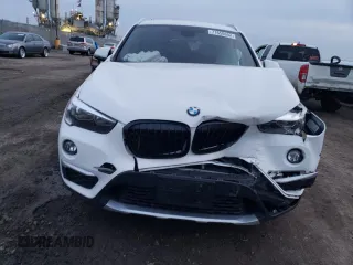 2018 BMW X1 sDrive28i with VIN WBXHU7C35J5H43995, listed as a Copart auction lot 71650602 with 80,437 mi miles. Bid and sale history available at carsss.com. Image 5.