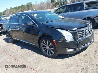 2014 Cadillac XTS with VIN 2G61L5S38E9202763, listed as a IAAI auction lot 41820564 with 117,709 mi miles. Bid and sale history available at carsss.com. Image 1.