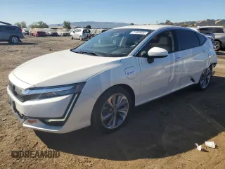 2018 Honda Clarity Plug-In Hybrid with VIN JHMZC5F16JC010946, listed as a Copart auction lot 71469454 with 62,400 mi miles and Salvage Title. Bid and sale history available at carsss.com. Image 1.