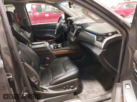 2016 Chevrolet Tahoe LTZ with VIN 1GNSKCKC1GR201155, listed as a IAAI auction lot 42235228 with 184,585 mi miles and . Bid and sale history available at DreamBid. Image 5.