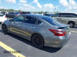 2017 Nissan Altima S with VIN 1N4AL3AP0HC297523, listed as a IAAI auction lot 42525818 with 162,767 mi miles and . Bid and sale history available at DreamBid. Image 3.