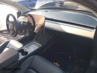 2022 Tesla Model 3 Performance with VIN 5YJ3E1EC5NF270082, listed as a IAAI auction lot 40930688 with 1 mi miles. Bid and sale history available at carsss.com. Image 5.