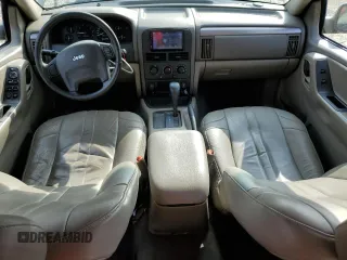 2003 Jeep Grand Cherokee Laredo with VIN 1J4GX48S43C609354, listed as a Copart auction lot 43924595 with 212,949 mi miles and Salvage Title. Bid and sale history available at carsss.com. Image 8.