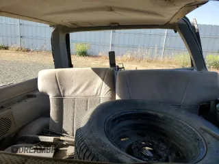 1989 Ford Bronco with VIN 1FMCU14T0KUA33910, listed as a Copart auction lot 57730195 with 53,335 mi miles and Salvage title. Bid and sale history available at DreamBid. Image 10.