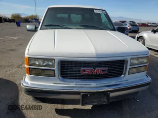 1999 GMC Suburban with VIN 3GKEC16R6XG538009, listed as a Copart auction lot 87112424 with 220,487 mi miles and Clean Title. Bid and sale history available at DreamBid. Image 5.