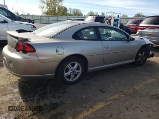 2005 Dodge Stratus SXT z VIN 4B3AG42G25E038535, wystawiony jako Copart lot #75240094 z przebiegiem Nie podano mil oraz Szkody całkowita. Historia ofert i sprzedaży dostępna na DreamBid. Obrazek 3.