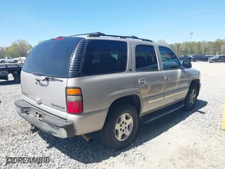 2004 Chevrolet Tahoe LT with VIN 1GNEC13Z34J304556, listed as a IAAI auction lot 41911229 with 275,494 mi miles. Bid and sale history available at carsss.com. Image 4.