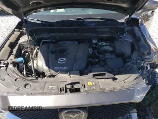 2018 Mazda CX-5 Grand Touring with VIN JM3KFADM2J1313418, listed as a Copart auction lot 49486875 with 94,930 mi miles and Salvage Title. Bid and sale history available at carsss.com. Image 12.