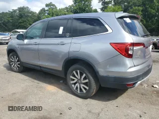 2022 Honda Pilot EX-L with VIN 5FNYF6H55NB000895, listed as a Copart auction lot 64764535 with 150,157 mi miles and Clean title. Bid and sale history available at DreamBid. Image 2.