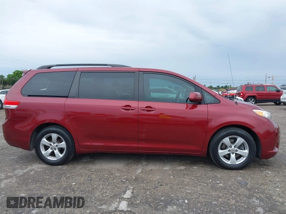 2012 Toyota Sienna LE AAS with VIN 5TDKK3DC2CS193746, listed as a IAAI auction lot 41656325 with 170,049 mi miles. Bid and sale history available at carsss.com. Image 13.